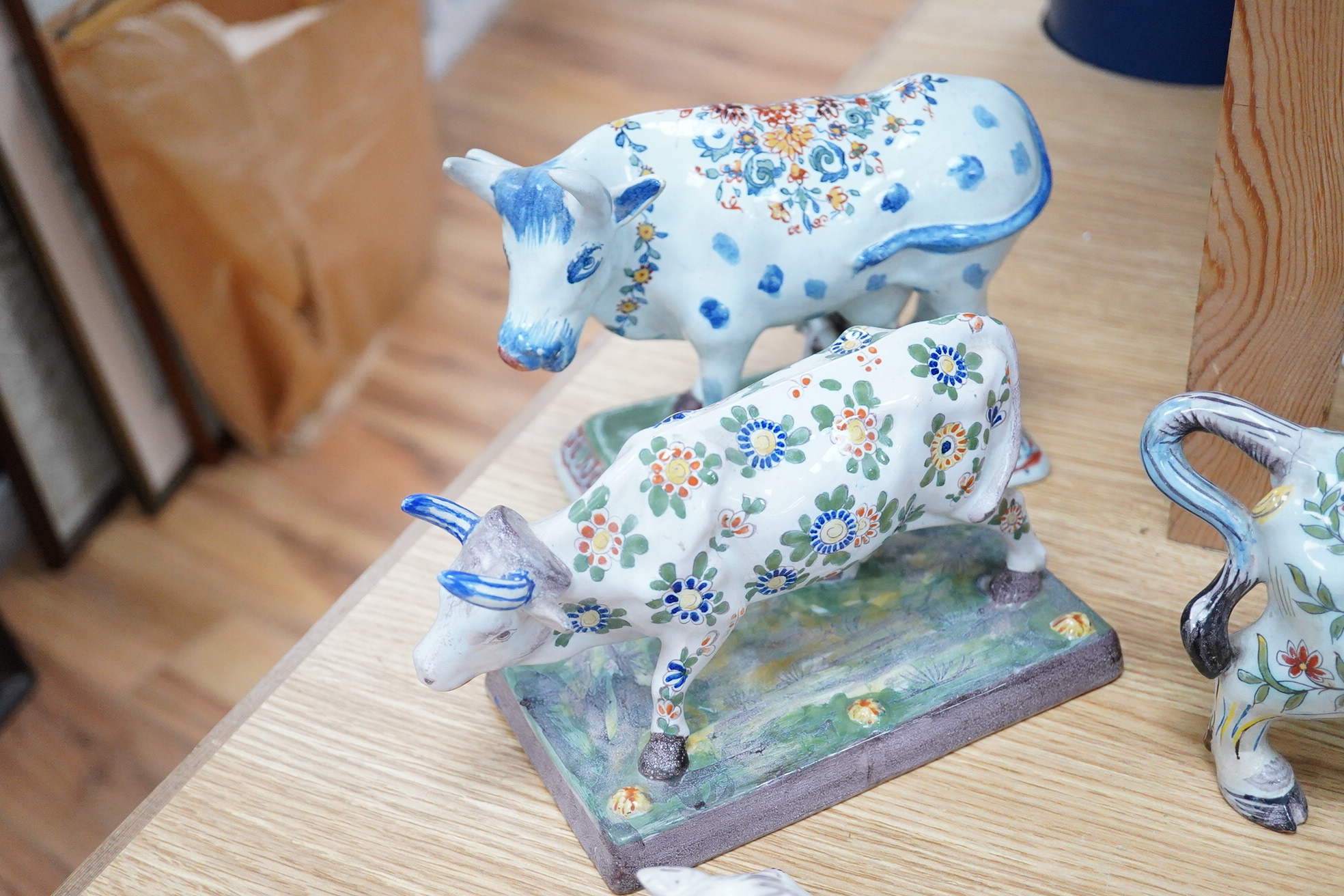 19th century French faience models of cows, a cat and a frog .(9), Tallest 30 cm